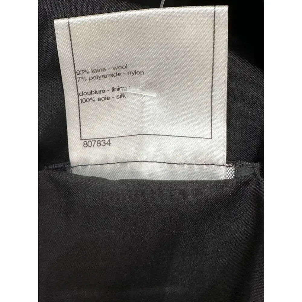 CHANEL Black Bouclé Wool A-Line Skirt with CC Button - FR 48